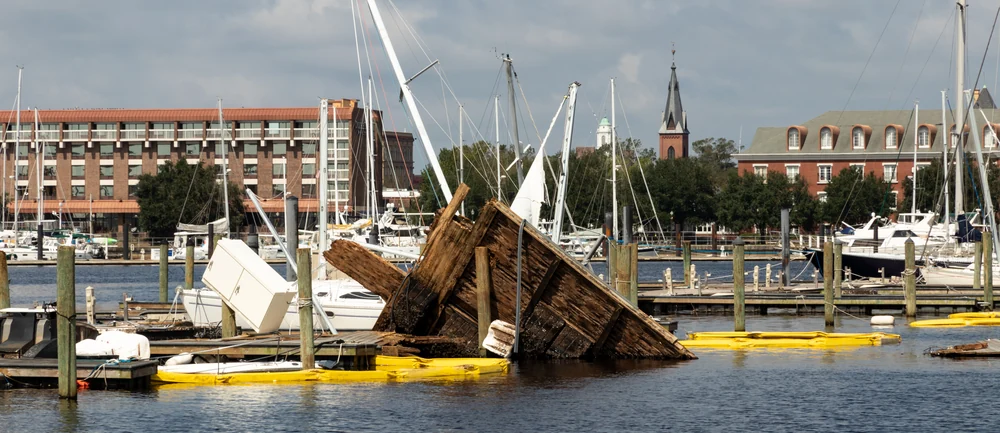 Hurricane damage to marina docks and vessels.