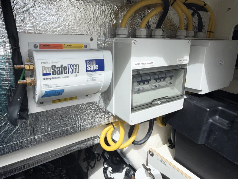 Marine galvanic isolator and shore-power breaker enclosures.